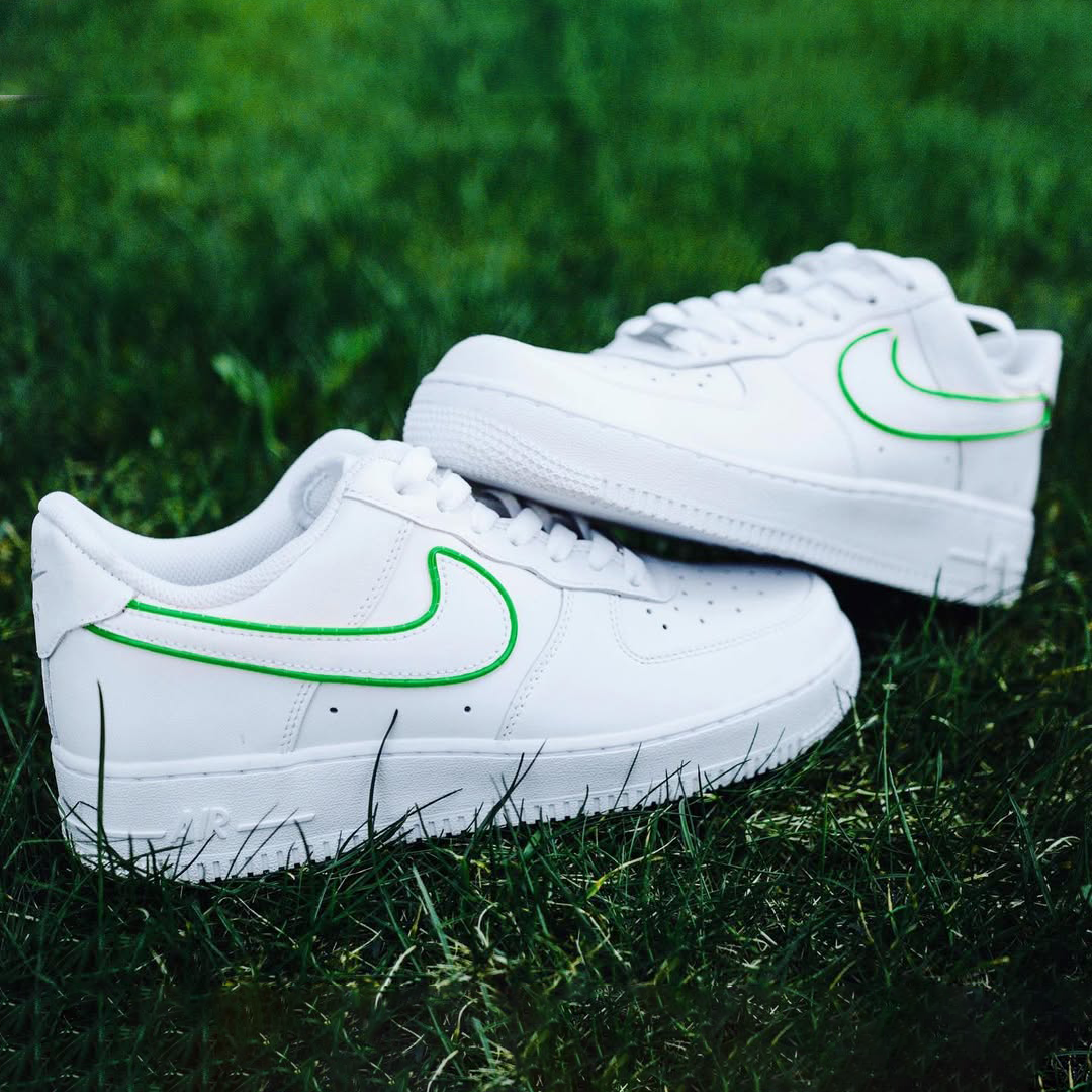 Customized Air Force 1 Sneakers with Neon Lights on grassy background